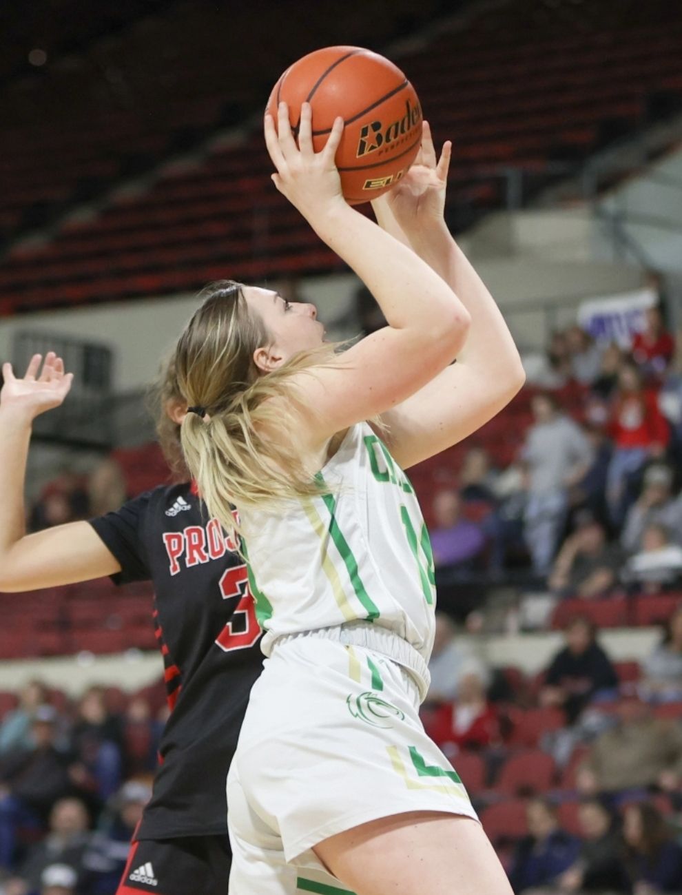 Ashtynn Egan goes up for two points. / Photo by Tommy B. Robinson