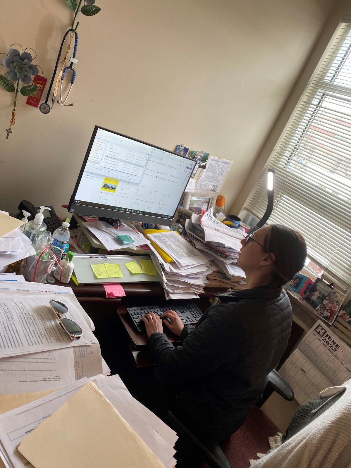 LBHC Business Department instructor Jamie (Riley) Zingg prepares lesson plans for the upcoming semester on Tuesday. Zingg, who grew up in the Black Lodge District, is going on her fifth year of teaching at Little Big Horn College. / Photo by Rusty LaFrance, Four Points Press