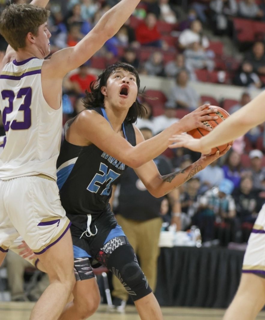 Amelio Blackhorse rises up for a left handed shot in the lane. / Photo by Tommy B. Robinson