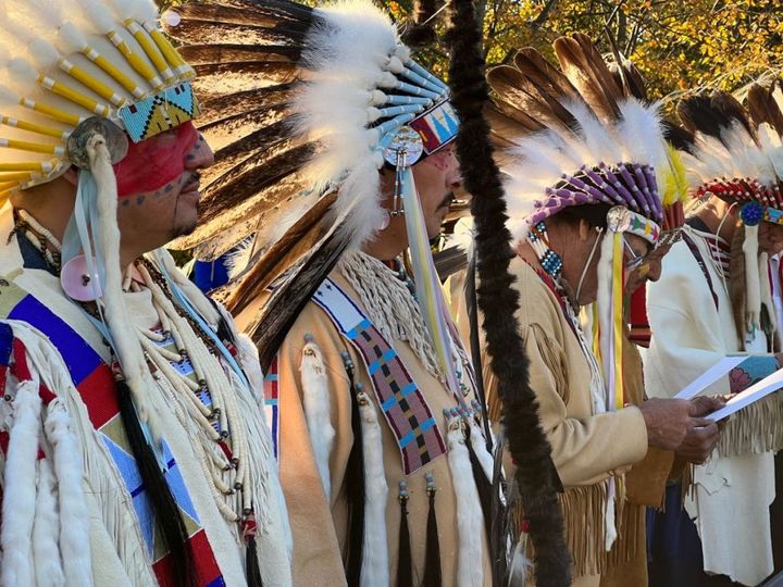 Chief Plenty Coups Honor Guard, all descendants of Chief Plenty Coups, waiting for smudging and the public flower ceremonies